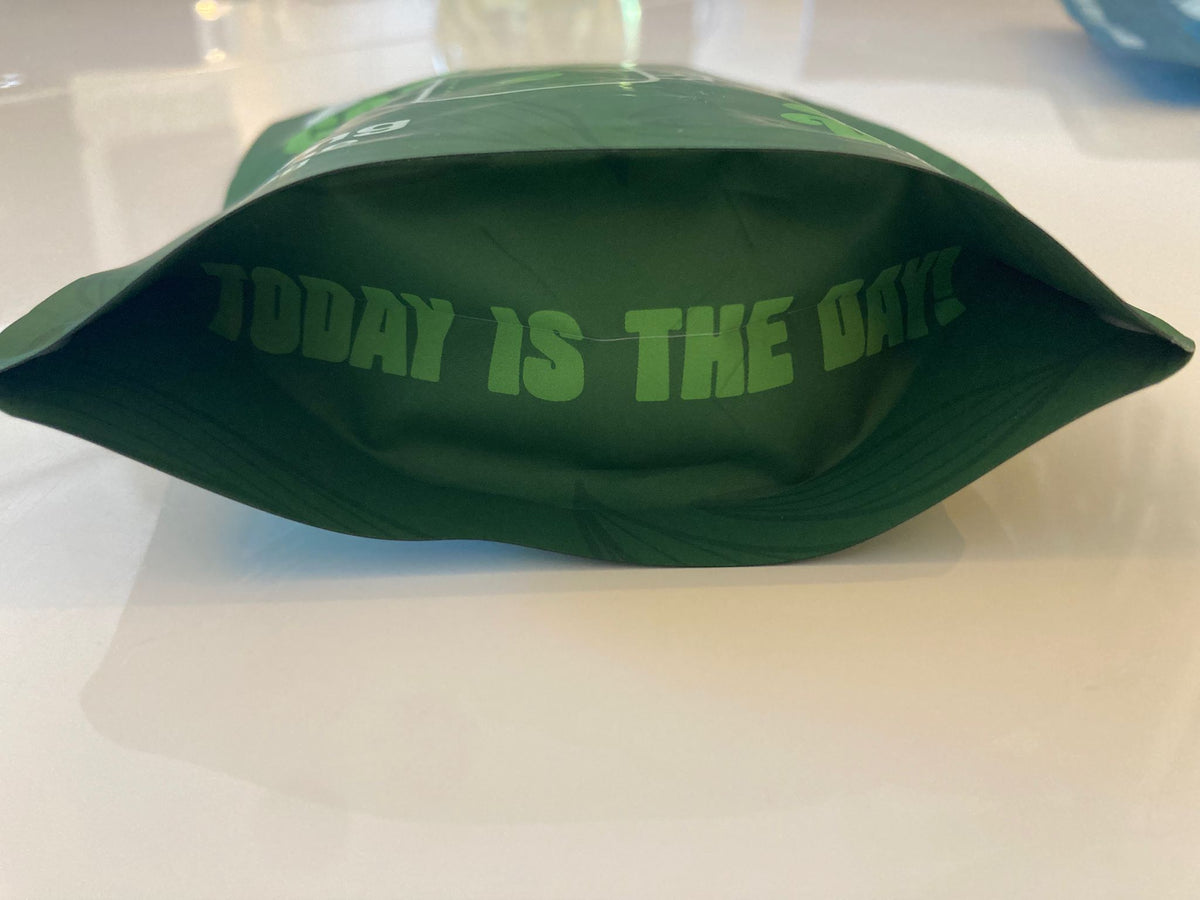 Base of the green Cups Full Pace pouch printed with 'Today is the day'