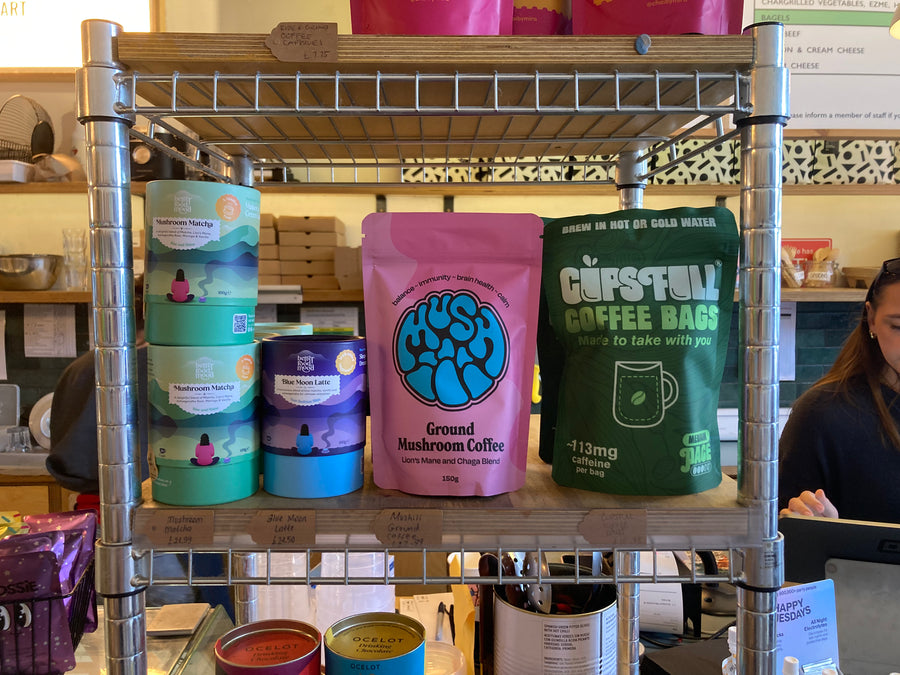 Cups Full coffee bags on a shop shelf