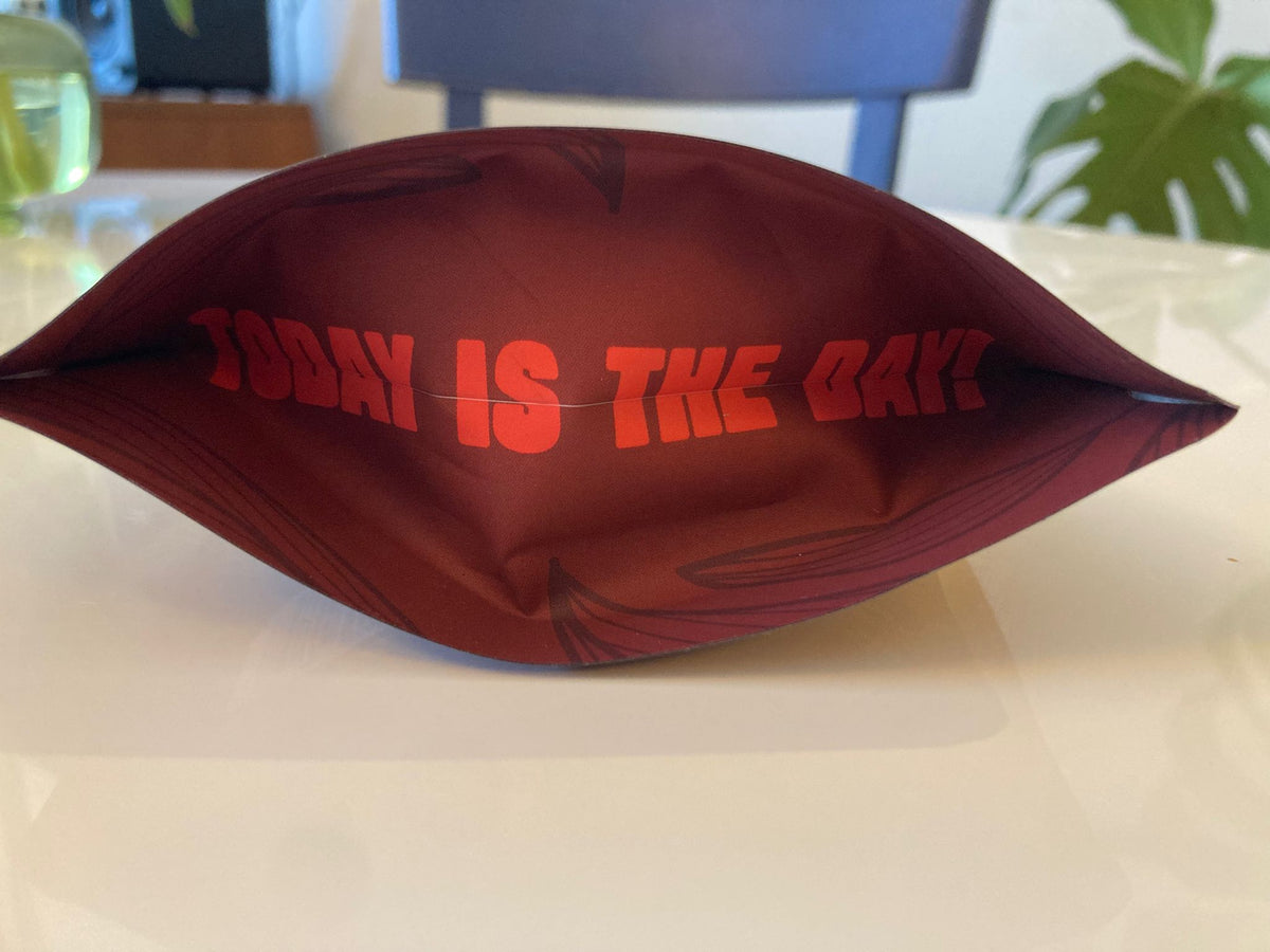 Base of the red Cups Full Power pouch printed with 'Today is the day'